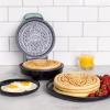 imageUncanny Brands Marvel Spiderman Waffle Maker Spideys Mask on Your Waffles Waffle IronLoki
